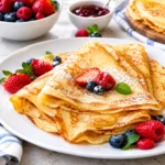 Das perfekte crepes rezept mit kulinarischer Physik: Hauchdünn, goldbraun & reißfest. Entdecke das Geheimnis der französischen Pâtisserie für Zuhause!