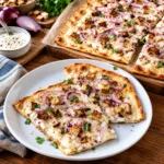 Meistere das beste flammkuchen rezept! Lerne die Thermodynamik für einen pergamentartigen Boden und cremigen Belag kennen. Einfach unwiderstehlich